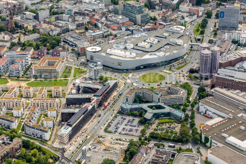 Essen from the bird's eye view: Construction site for the office building of Funke Media Group on Berliner Platz in Essen in the state of North Rhine-Westphalia. Executing construction company is Hochtief Aktiengesellschaft