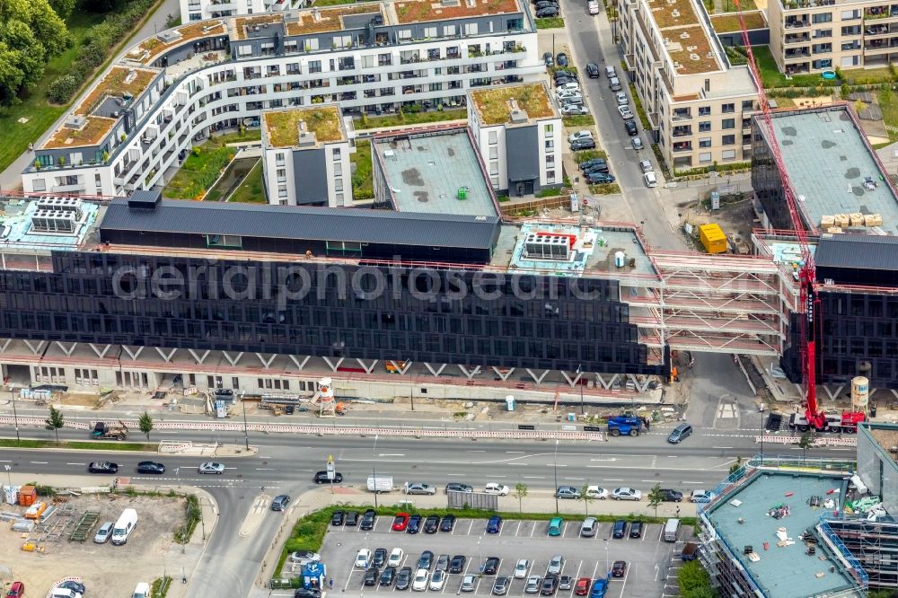 Essen from the bird's eye view: Construction site for the office building of Funke Media Group on Berliner Platz in Essen in the state of North Rhine-Westphalia. Executing construction company is Hochtief Aktiengesellschaft