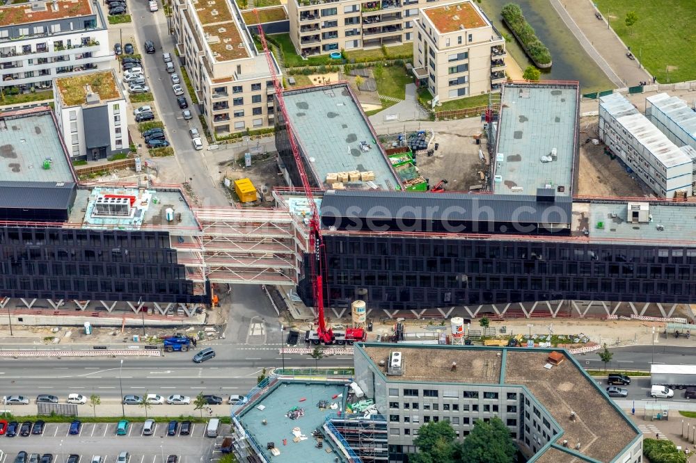 Aerial image Essen - Construction site for the office building of Funke Media Group on Berliner Platz in Essen in the state of North Rhine-Westphalia. Executing construction company is Hochtief Aktiengesellschaft