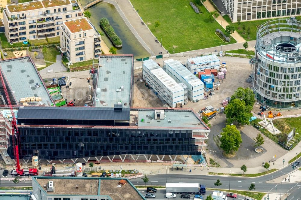 Aerial photograph Essen - Construction site for the office building of Funke Media Group on Berliner Platz in Essen in the state of North Rhine-Westphalia. Executing construction company is Hochtief Aktiengesellschaft