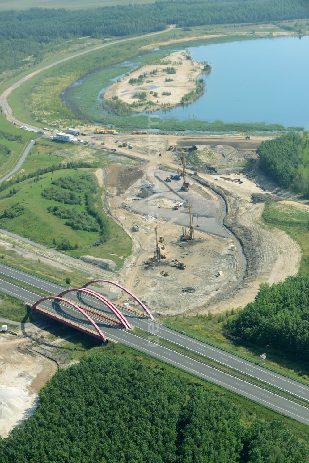 Zwenkau from the bird's eye view: Construction Iste of new build connecting cannel Harthkanal between the Lake Zwenkau and Lake Cospuden with the leading highway bridge of the federal motorway A38 in Zwenkau in Saxony