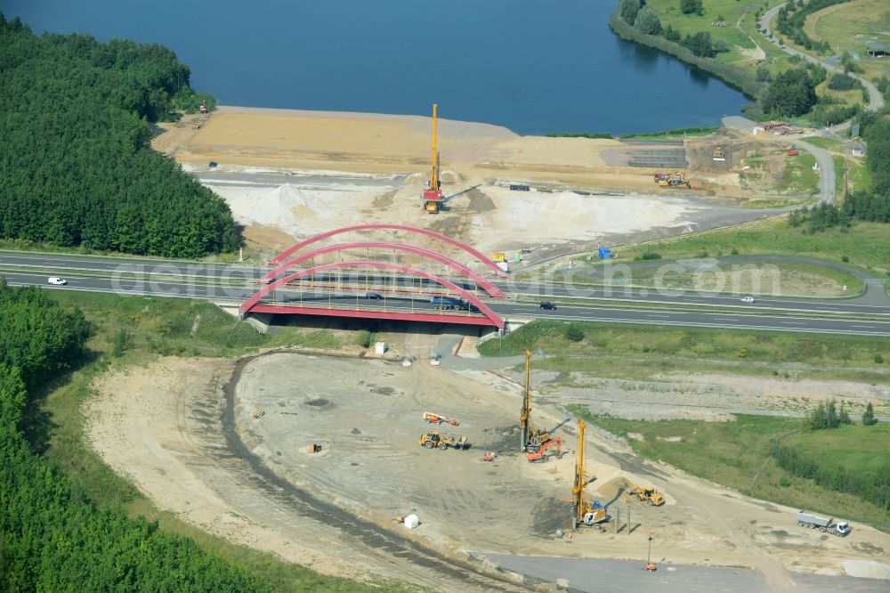 Zwenkau from above - Construction Iste of new build connecting cannel Harthkanal between the Lake Zwenkau and Lake Cospuden with the leading highway bridge of the federal motorway A38 in Zwenkau in Saxony