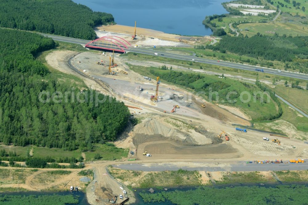 Zwenkau from the bird's eye view: Construction Iste of new build connecting cannel Harthkanal between the Lake Zwenkau and Lake Cospuden with the leading highway bridge of the federal motorway A38 in Zwenkau in Saxony