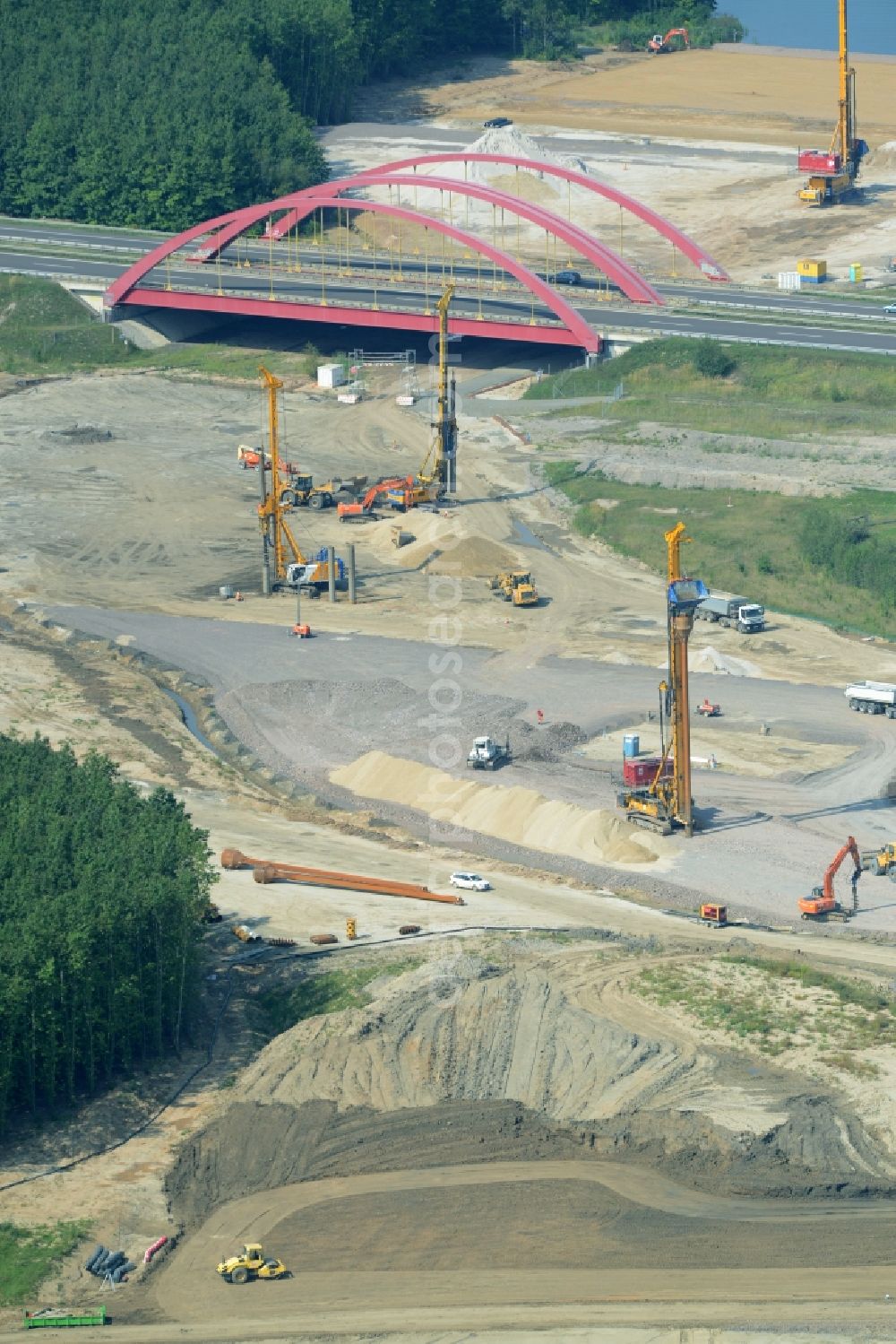 Zwenkau from the bird's eye view: Construction Iste of new build connecting cannel Harthkanal between the Lake Zwenkau and Lake Cospuden with the leading highway bridge of the federal motorway A38 in Zwenkau in Saxony