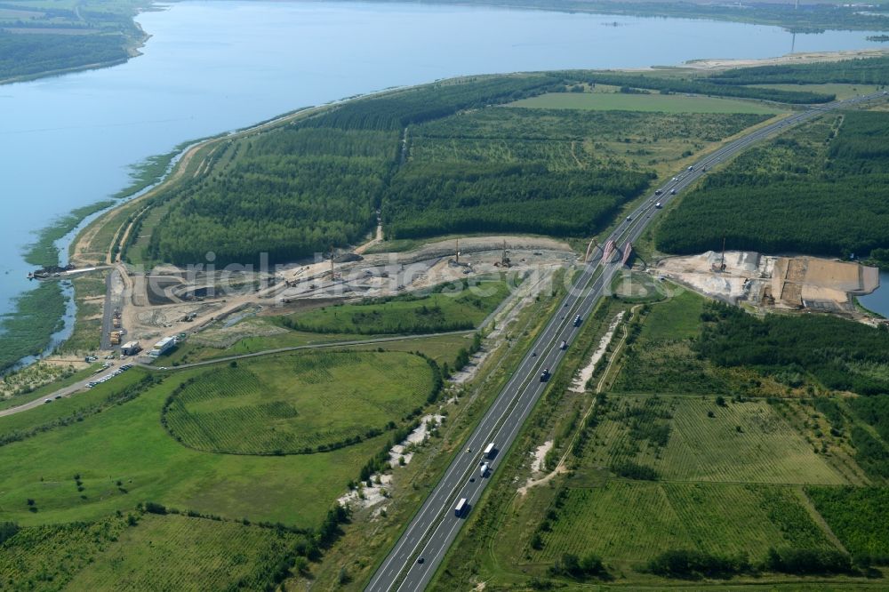 Zwenkau from the bird's eye view: Construction Iste of new build connecting cannel Harthkanal between the Lake Zwenkau and Lake Cospuden with the leading highway bridge of the federal motorway A38 in Zwenkau in Saxony