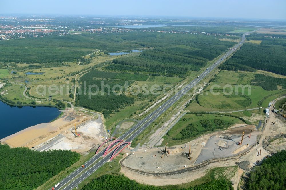 Zwenkau from the bird's eye view: Construction Iste of new build connecting cannel Harthkanal between the Lake Zwenkau and Lake Cospuden with the leading highway bridge of the federal motorway A38 in Zwenkau in Saxony