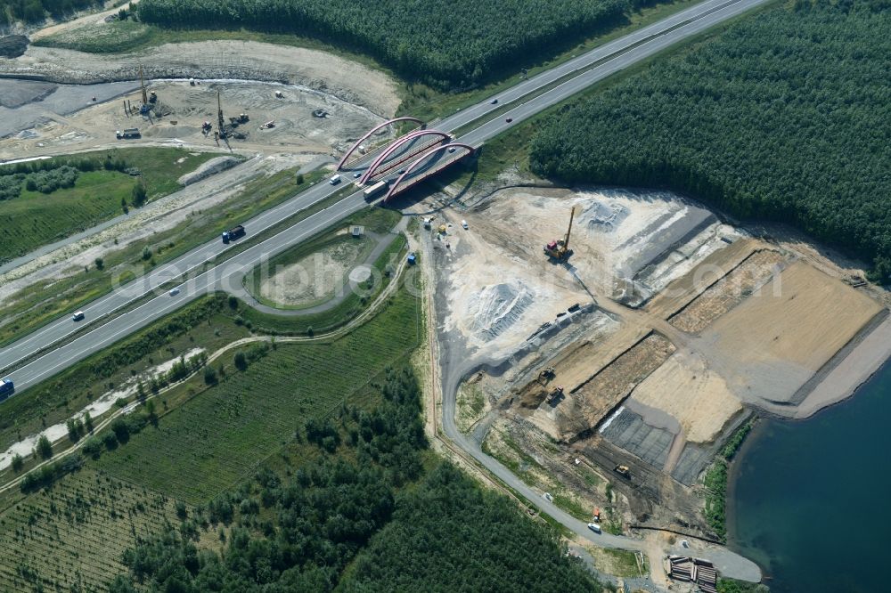 Zwenkau from above - Construction Iste of new build connecting cannel Harthkanal between the Lake Zwenkau and Lake Cospuden with the leading highway bridge of the federal motorway A38 in Zwenkau in Saxony