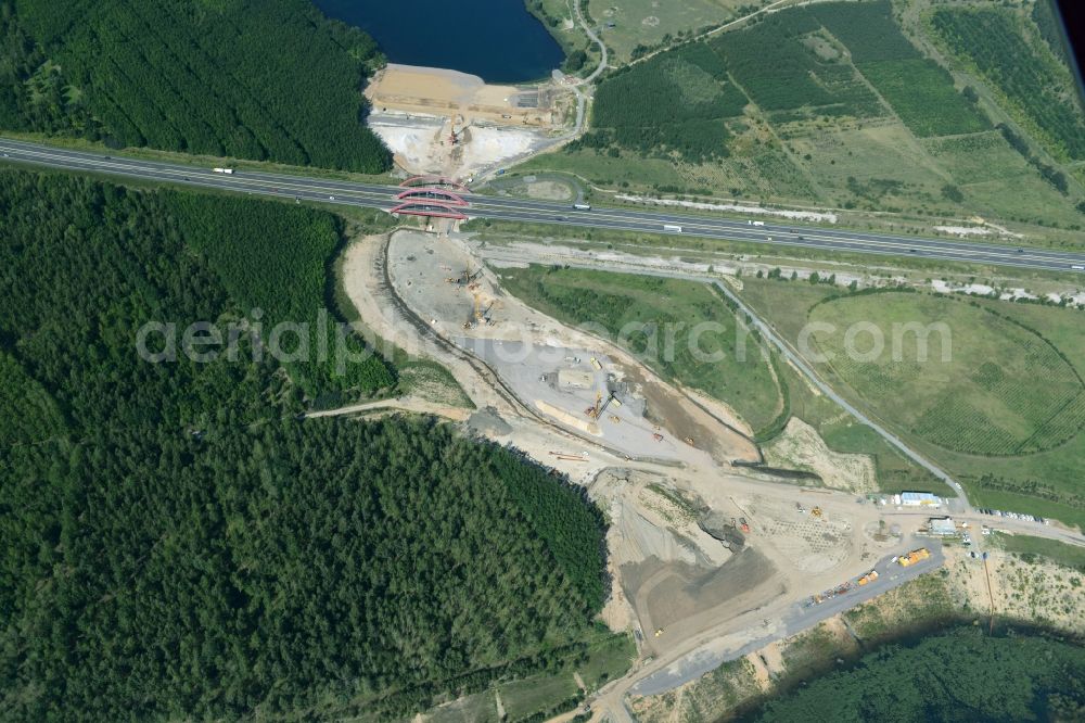 Zwenkau from the bird's eye view: Construction Iste of new build connecting cannel Harthkanal between the Lake Zwenkau and Lake Cospuden with the leading highway bridge of the federal motorway A38 in Zwenkau in Saxony