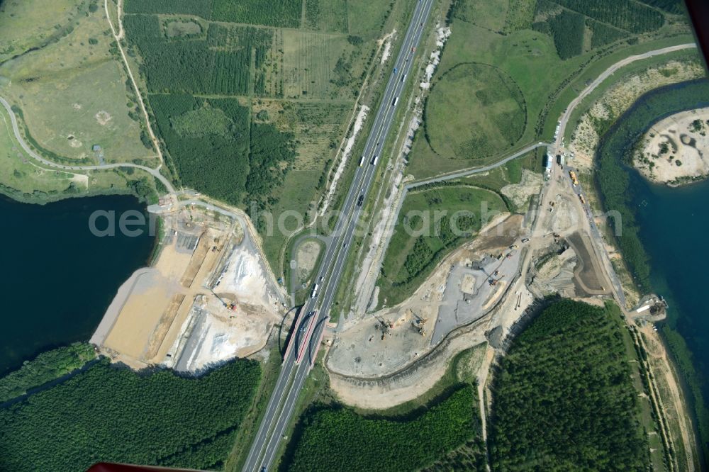 Zwenkau from the bird's eye view: Construction Iste of new build connecting cannel Harthkanal between the Lake Zwenkau and Lake Cospuden with the leading highway bridge of the federal motorway A38 in Zwenkau in Saxony