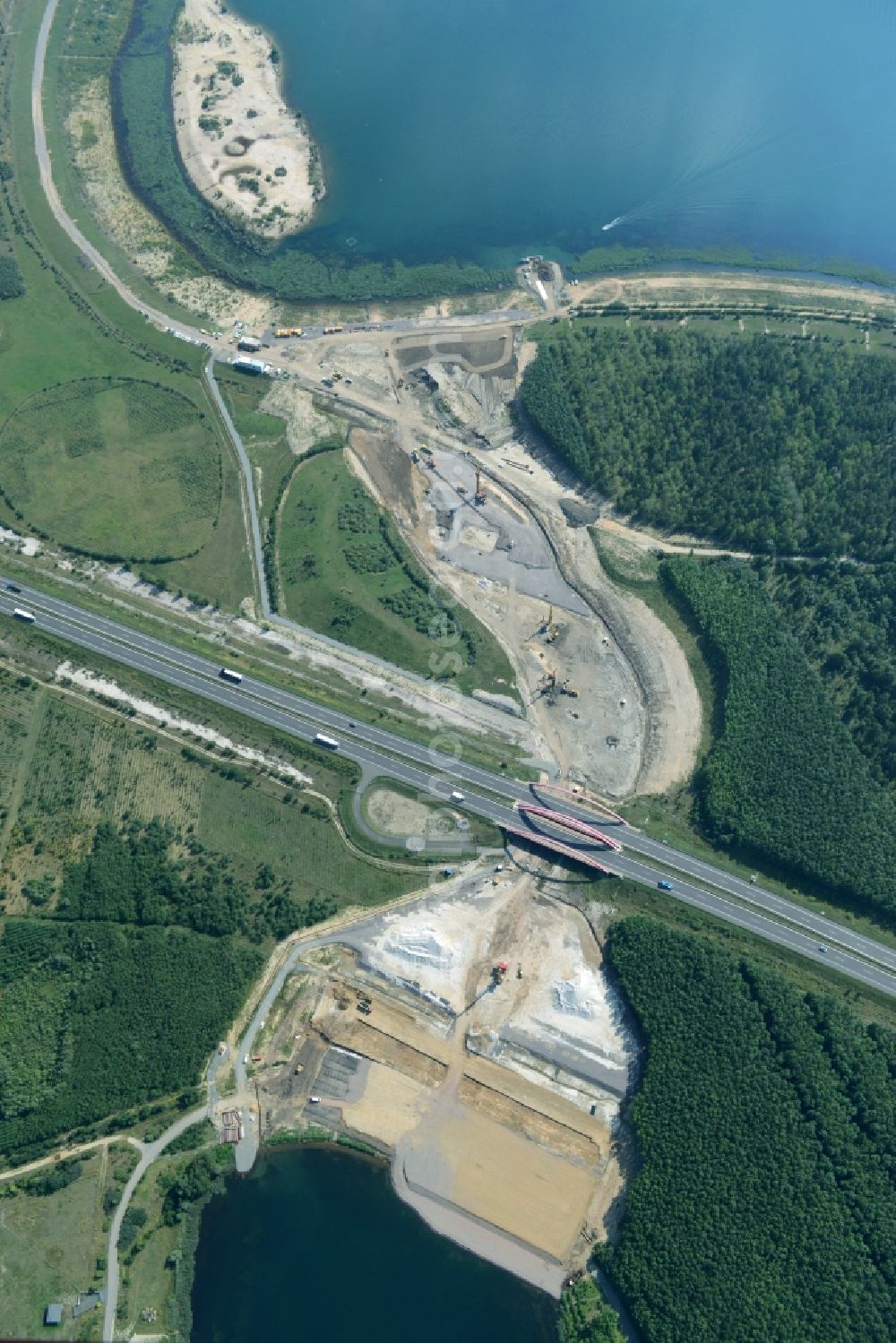 Zwenkau from above - Construction Iste of new build connecting cannel Harthkanal between the Lake Zwenkau and Lake Cospuden with the leading highway bridge of the federal motorway A38 in Zwenkau in Saxony