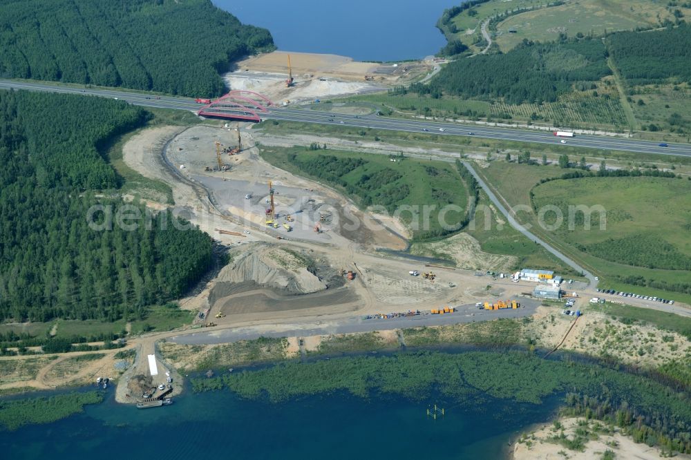 Zwenkau from the bird's eye view: Construction Iste of new build connecting cannel Harthkanal between the Lake Zwenkau and Lake Cospuden with the leading highway bridge of the federal motorway A38 in Zwenkau in Saxony