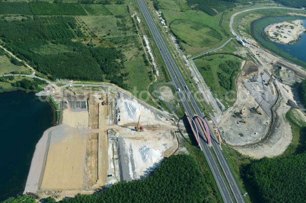 Zwenkau from the bird's eye view: Construction Iste of new build connecting cannel Harthkanal between the Lake Zwenkau and Lake Cospuden with the leading highway bridge of the federal motorway A38 in Zwenkau in Saxony