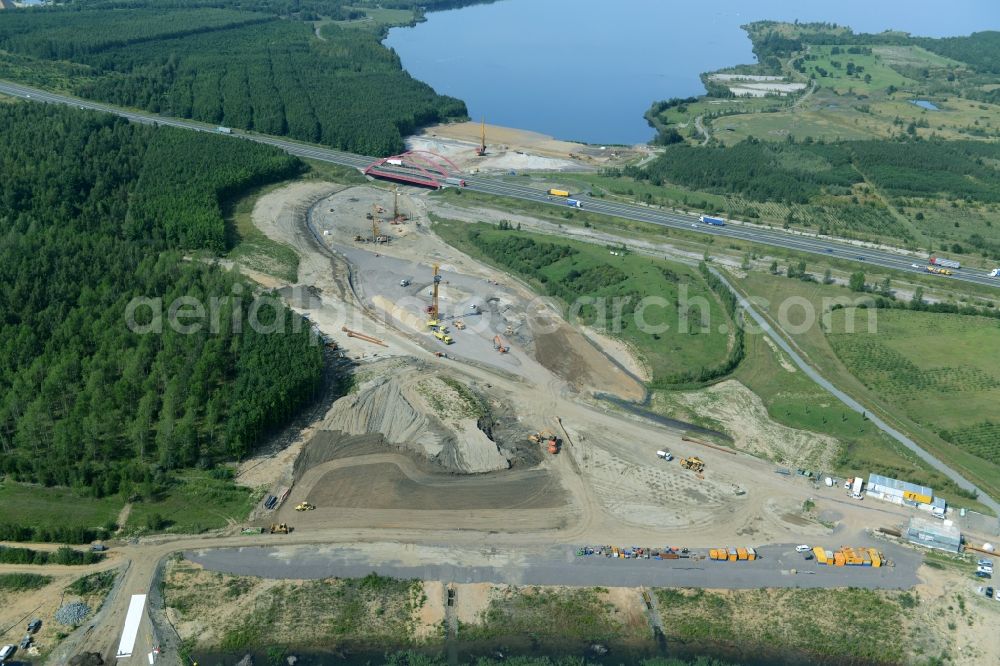 Zwenkau from the bird's eye view: Construction Iste of new build connecting cannel Harthkanal between the Lake Zwenkau and Lake Cospuden with the leading highway bridge of the federal motorway A38 in Zwenkau in Saxony