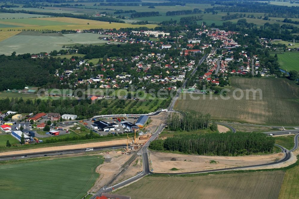 Fehrbellin from above - Construction site for the expansion of traffic flow on the motorway BAB A 24 in the district Tarmow in Fehrbellin in the state Brandenburg, Germany