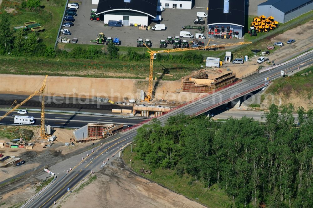 Aerial image Fehrbellin - Construction site for the expansion of traffic flow on the motorway BAB A 24 in the district Tarmow in Fehrbellin in the state Brandenburg, Germany