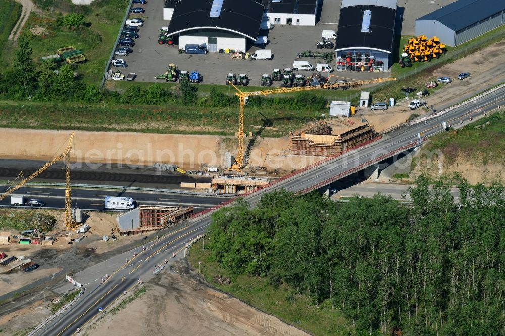 Aerial photograph Fehrbellin - Construction site for the expansion of traffic flow on the motorway BAB A 24 in the district Tarmow in Fehrbellin in the state Brandenburg, Germany