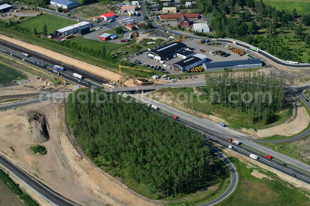 Fehrbellin from above - Construction site for the expansion of traffic flow on the motorway BAB A 24 in the district Tarmow in Fehrbellin in the state Brandenburg, Germany