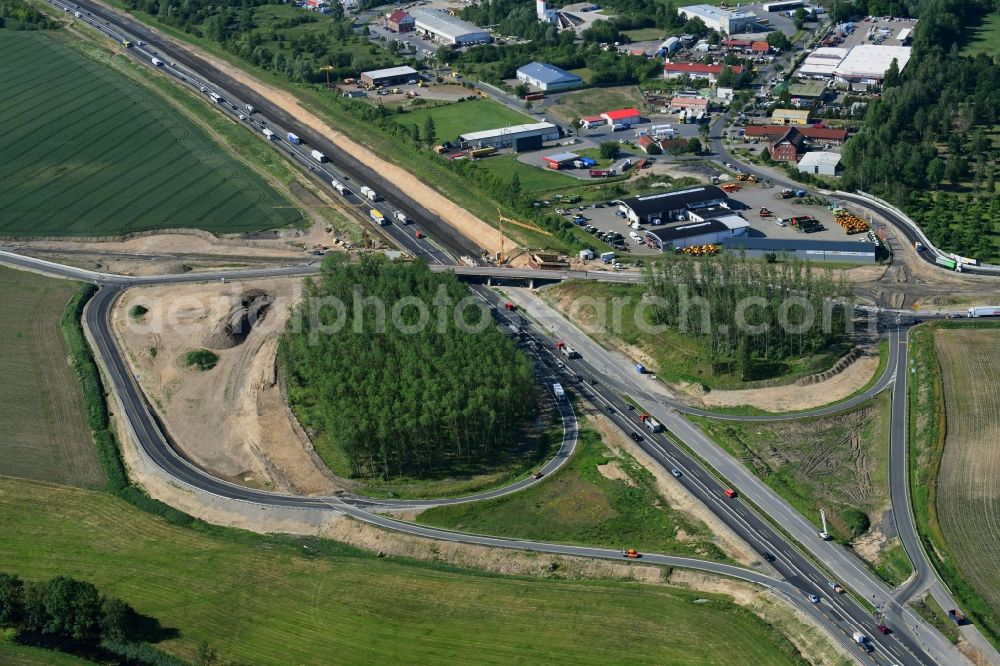 Fehrbellin from the bird's eye view: Construction site for the expansion of traffic flow on the motorway BAB A 24 in the district Tarmow in Fehrbellin in the state Brandenburg, Germany