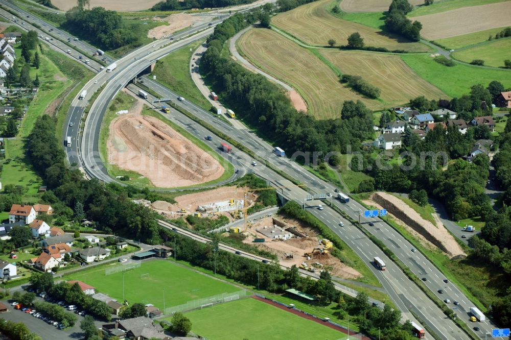 Aerial photograph Kirchheim - Construction to extend the traffic flow at the intersection- motorway A 7 in Kirchheim in the state Hesse, Germany