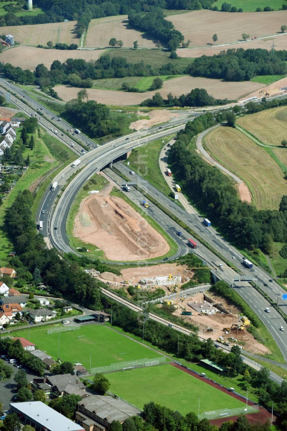 Kirchheim from above - Construction to extend the traffic flow at the intersection- motorway A 7 in Kirchheim in the state Hesse, Germany