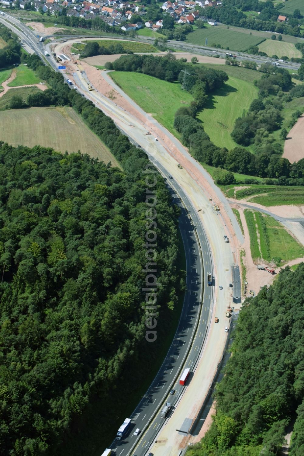 Kirchheim from above - Construction to extend the traffic flow at the intersection- motorway A 7 in Kirchheim in the state Hesse, Germany