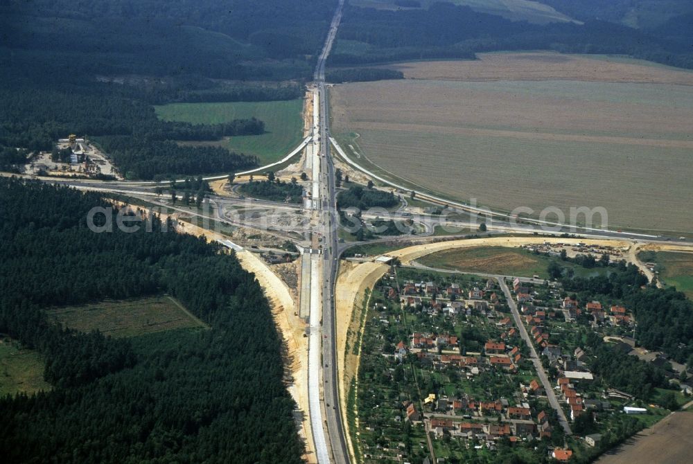 Hermsdorf from above - Constration Site at the traffic control and roadways of the design and lay-out of a road in the interchange of the autobahn A9 / Hermsdorfer cross in village Herms in the federal state Thuringia