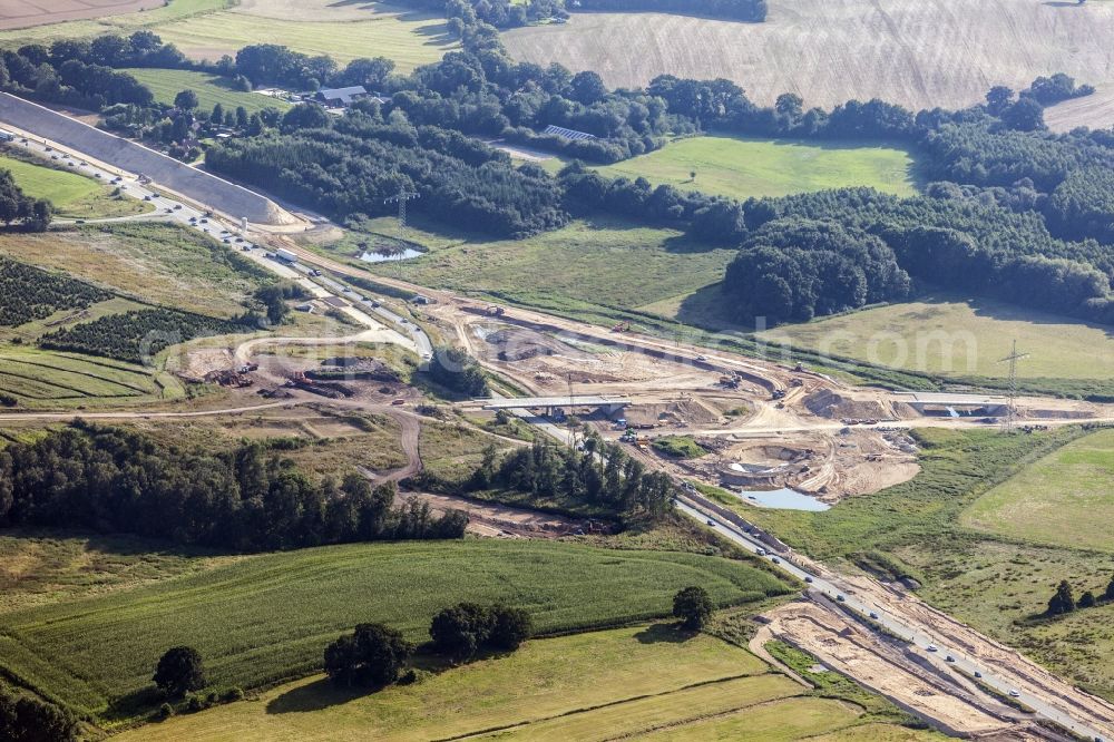 Aerial photograph Löptin - Construction to extend the traffic flow at the intersection- motorway A 21 / B 404 in the district Tanneneck in Loeptin in the state Schleswig-Holstein