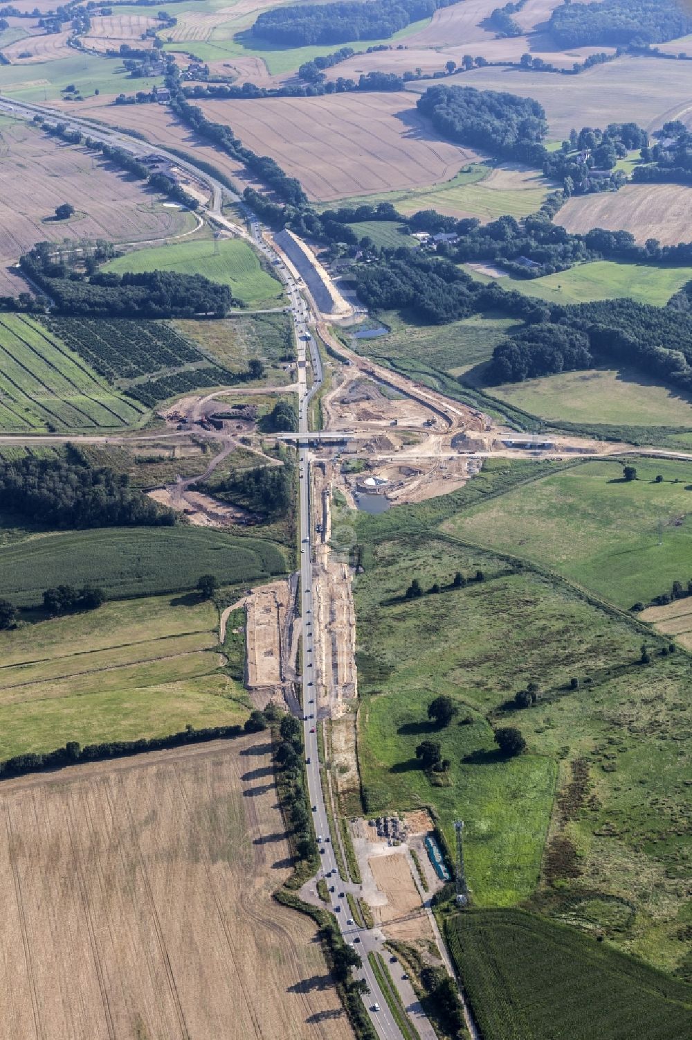 Löptin from the bird's eye view: Construction to extend the traffic flow at the intersection- motorway A 21 / B 404 in the district Tanneneck in Loeptin in the state Schleswig-Holstein