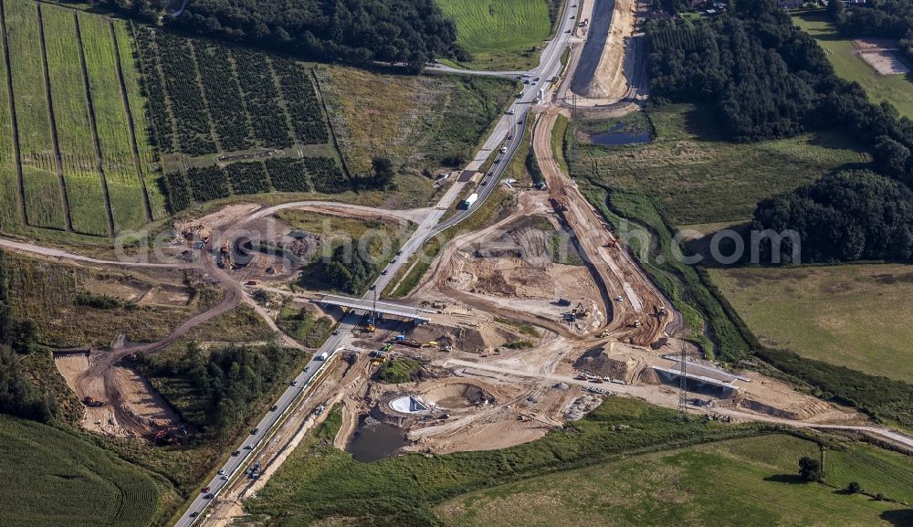 Aerial photograph Löptin - Construction to extend the traffic flow at the intersection- motorway A 21 / B 404 in the district Tanneneck in Loeptin in the state Schleswig-Holstein