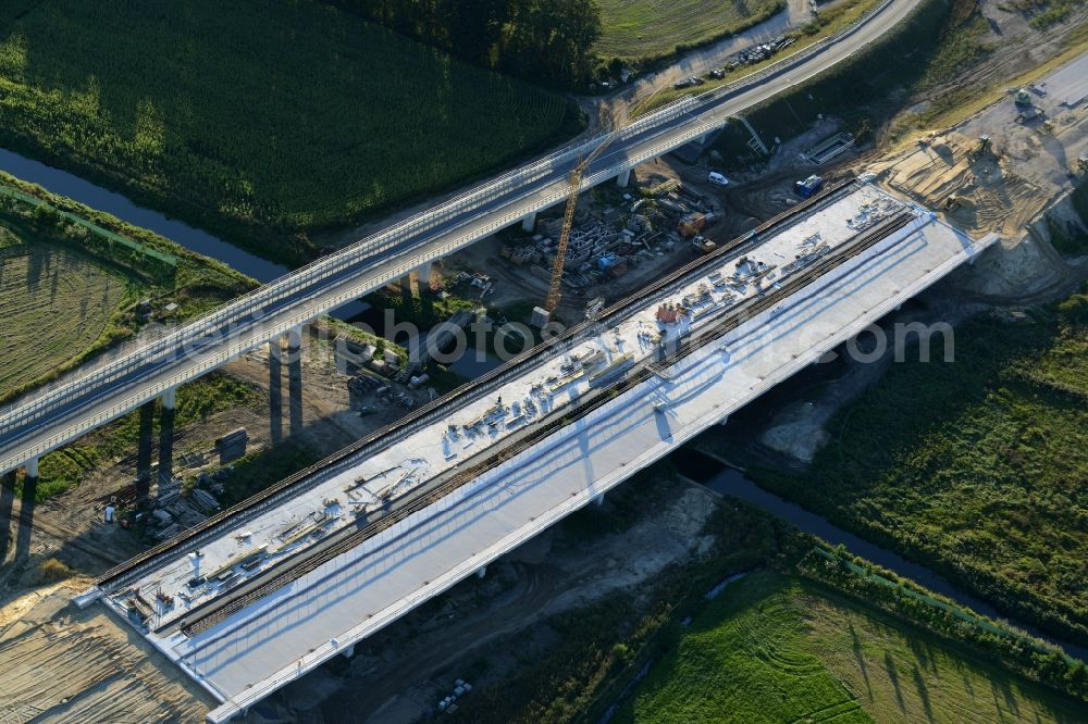 Aerial photograph Karstädt - Construction site for the expansion of traffic flow on the state road L13 in Karstaedt in the state Brandenburg