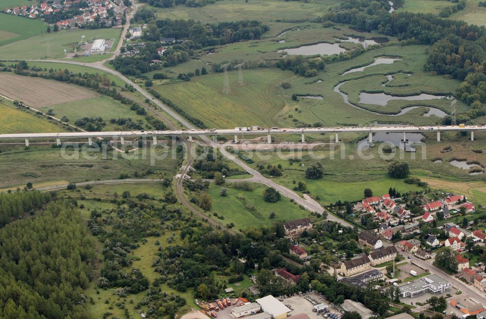 Rattmannsdorf from the bird's eye view: Construction site of viaduct of the railway bridge structure to route the railway tracks in Rattmannsdorf in the state Saxony-Anhalt, Germany