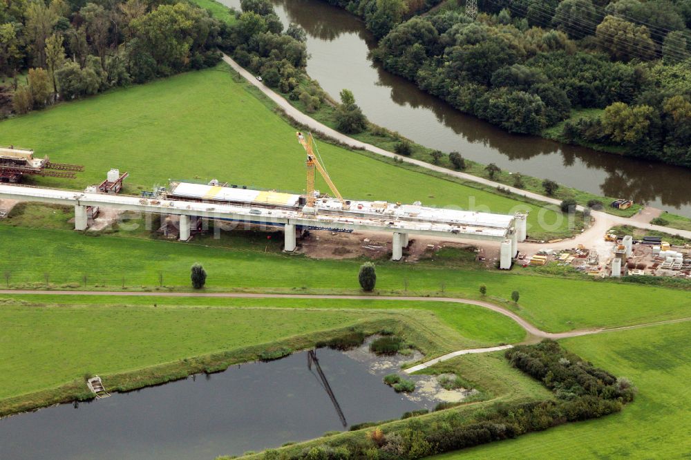 Rattmannsdorf from the bird's eye view: Construction site of viaduct of the railway bridge structure to route the railway tracks in Rattmannsdorf in the state Saxony-Anhalt, Germany