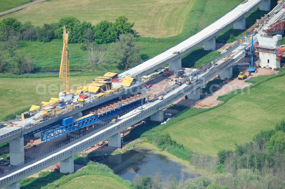 Rattmannsdorf from the bird's eye view: Construction site of viaduct of the railway bridge structure to route the railway tracks in Rattmannsdorf in the state Saxony-Anhalt, Germany