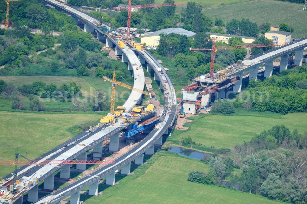 Rattmannsdorf from the bird's eye view: Construction site of viaduct of the railway bridge structure to route the railway tracks in Rattmannsdorf in the state Saxony-Anhalt, Germany