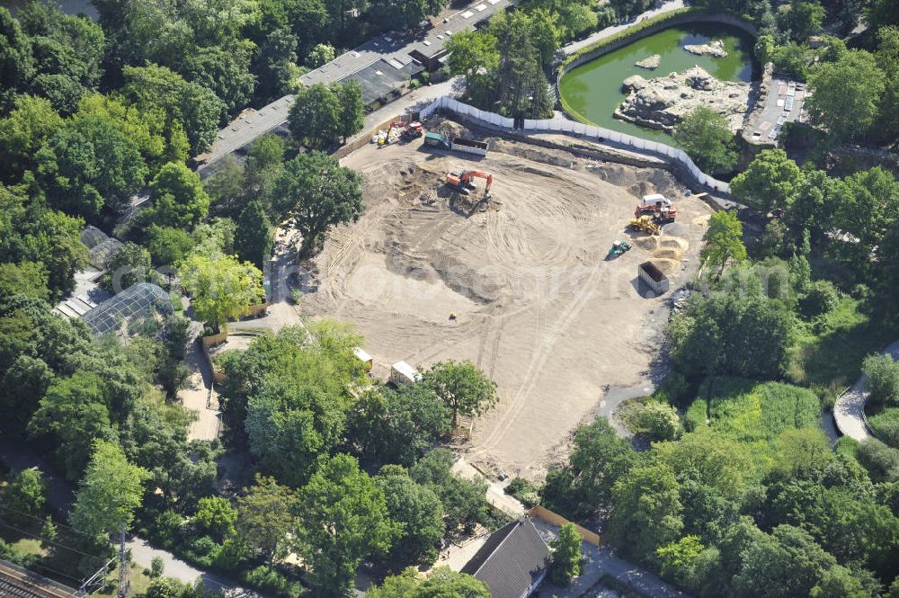 Berlin from above - Look at the construction site of the new volery of the Berlin Zoo which is in work since 2010. In the background is the basin of the icebear compound