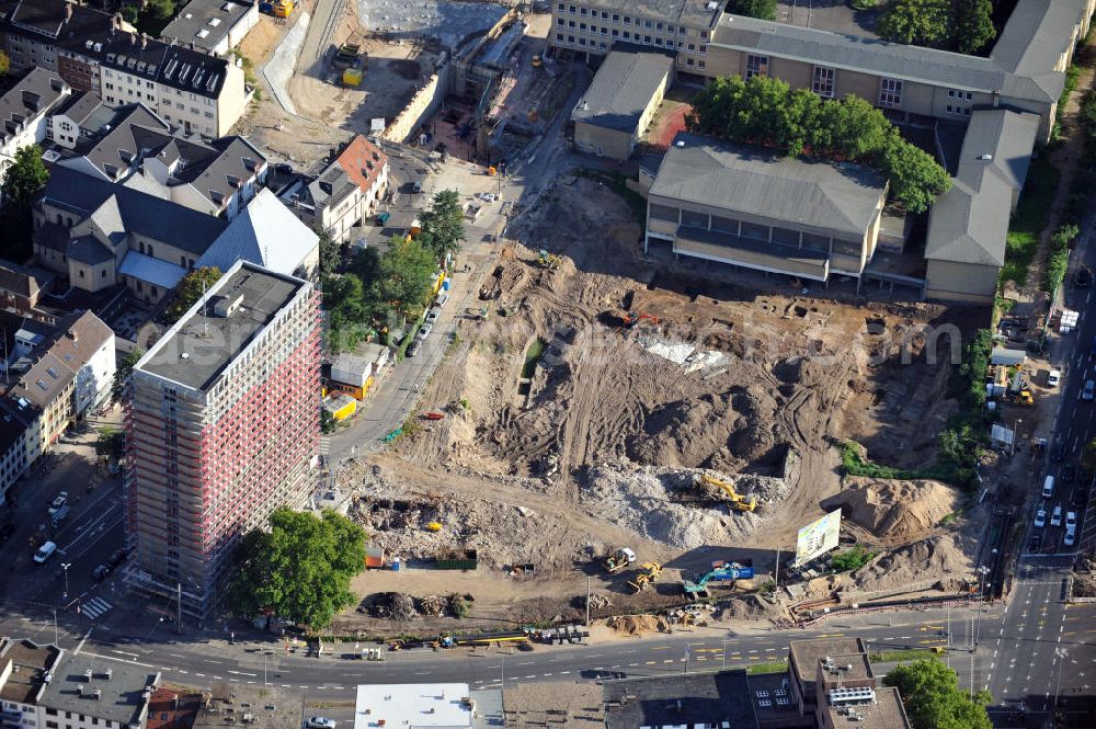 Aerial image Köln - Baustelle von Hotels, Wohn- und Geschäftshäusern am Waidmarkt mit dem alten Polizeipräsidium, der Kirche St. Georg und dem Friedrich-Wilhelm-Gymnasium in Köln-Altstadt-Süd in Nordrhein-Westfalen. Construction area of hotels, tenements and business buildings at Waidmarkt with former police headquarters, church St. Georg and school Friedrich-Wilhelm-Gymnasium in southern historic district of Cologne, North Rhine-Westphalia. Bauträger: