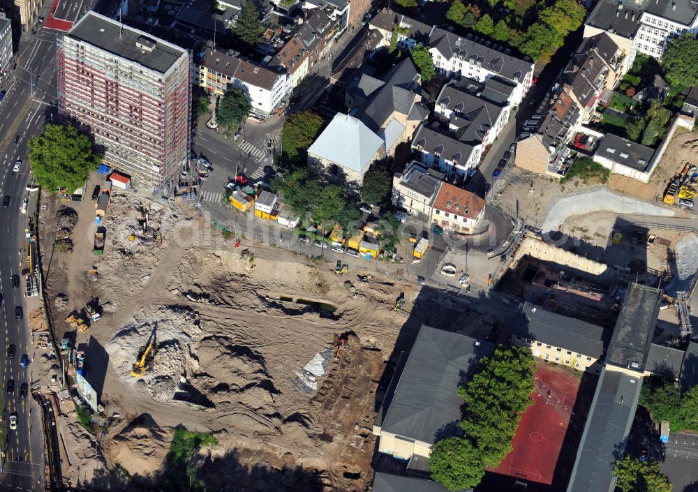 Aerial photograph Köln - Baustelle von Hotels, Wohn- und Geschäftshäusern am Waidmarkt mit dem alten Polizeipräsidium, der Kirche St. Georg und dem Friedrich-Wilhelm-Gymnasium in Köln-Altstadt-Süd in Nordrhein-Westfalen. Construction area of hotels, tenements and business buildings at Waidmarkt with former police headquarters, church St. Georg and school Friedrich-Wilhelm-Gymnasium in southern historic district of Cologne, North Rhine-Westphalia. Bauträger: