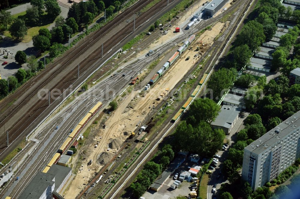 Berlin from the bird's eye view: Maintenance work on a rail track and overhead wiring harness in the route network of the Deutsche Bahn in the district Lichtenberg in Berlin, Germany