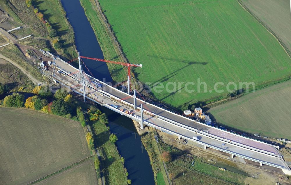 Aerial photograph Bad Oeynhausen - View of the construction site for the bridge structure over the Werre in Bad Oeynhausen in North Rhine-Westphalia. The construction company of this bridge is the Bickhardt Bau AG. Client is the Strassen.NRW