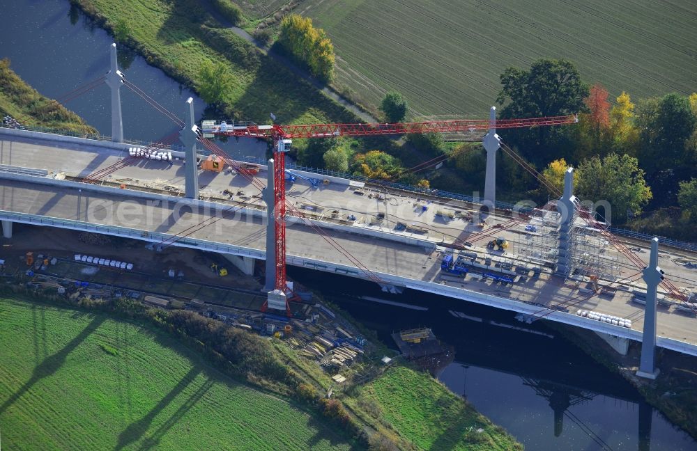 Aerial photograph Bad Oeynhausen - View of the construction site for the bridge structure over the Werre in Bad Oeynhausen in North Rhine-Westphalia. The construction company of this bridge is the Bickhardt Bau AG. Client is the Strassen.NRW