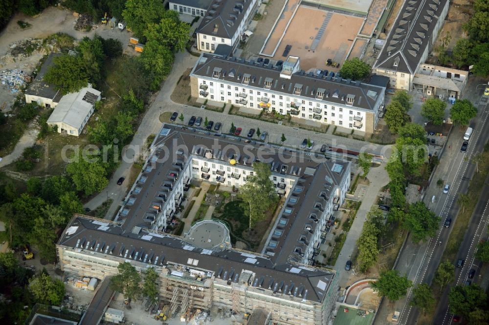 Aerial photograph Berlin - Construction works and residential buildings on site of the former US-Army-Headquarters in the Zehlendorf part of Berlin in Germany. The former army and military base is being redeveloped and new apartments, flats and accommodations are being created. The military buildings are refurbished