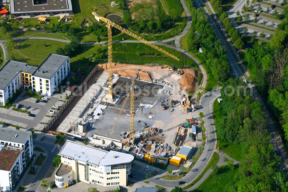 Aerial photograph Coburg - Construction site for the new construction of the building complex of a residential complex with an integrated local supply center auf of Bertelsdorfer Hoehe on street Max-Boehme-Ring in the district Ketschendorf in Coburg in the state Bavaria, Germany