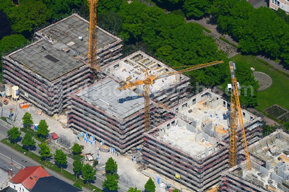 Rostock from the bird's eye view: Construction site to build a new multi-family residential complex Am Rosengarten on August-Bebel-Strasse - Wallstrasse in the district Stadtmitte in Rostock in the state Mecklenburg - Western Pomerania, Germany