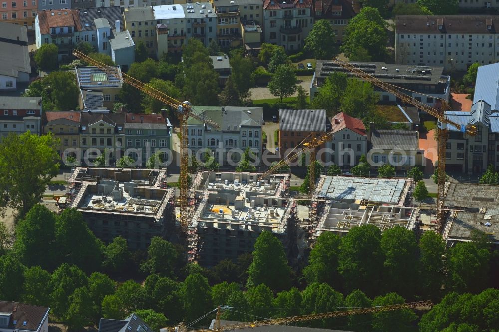 Rostock from the bird's eye view: Construction site to build a new multi-family residential complex Am Rosengarten on August-Bebel-Strasse - Wallstrasse in the district Stadtmitte in Rostock in the state Mecklenburg - Western Pomerania, Germany