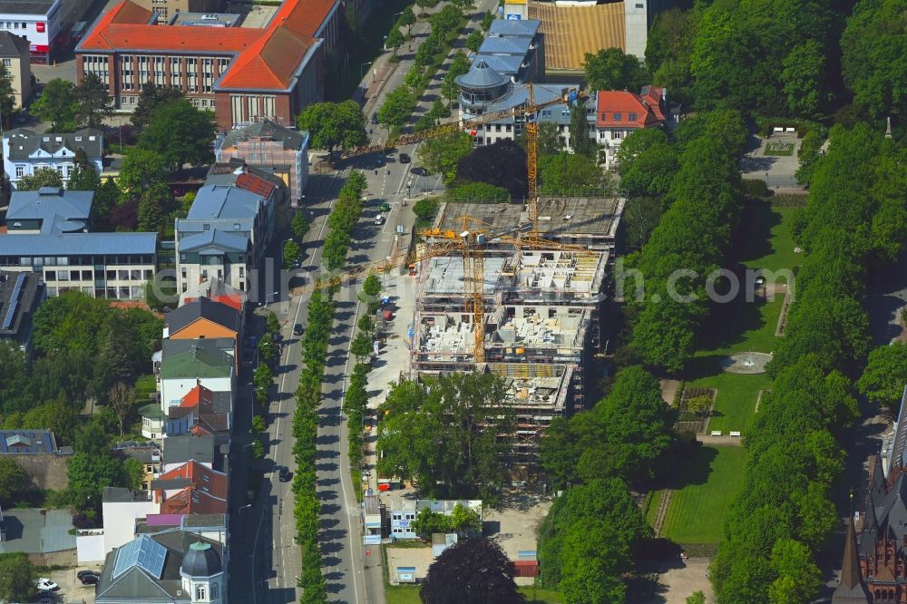 Rostock from the bird's eye view: Construction site to build a new multi-family residential complex Am Rosengarten on August-Bebel-Strasse - Wallstrasse in the district Stadtmitte in Rostock in the state Mecklenburg - Western Pomerania, Germany