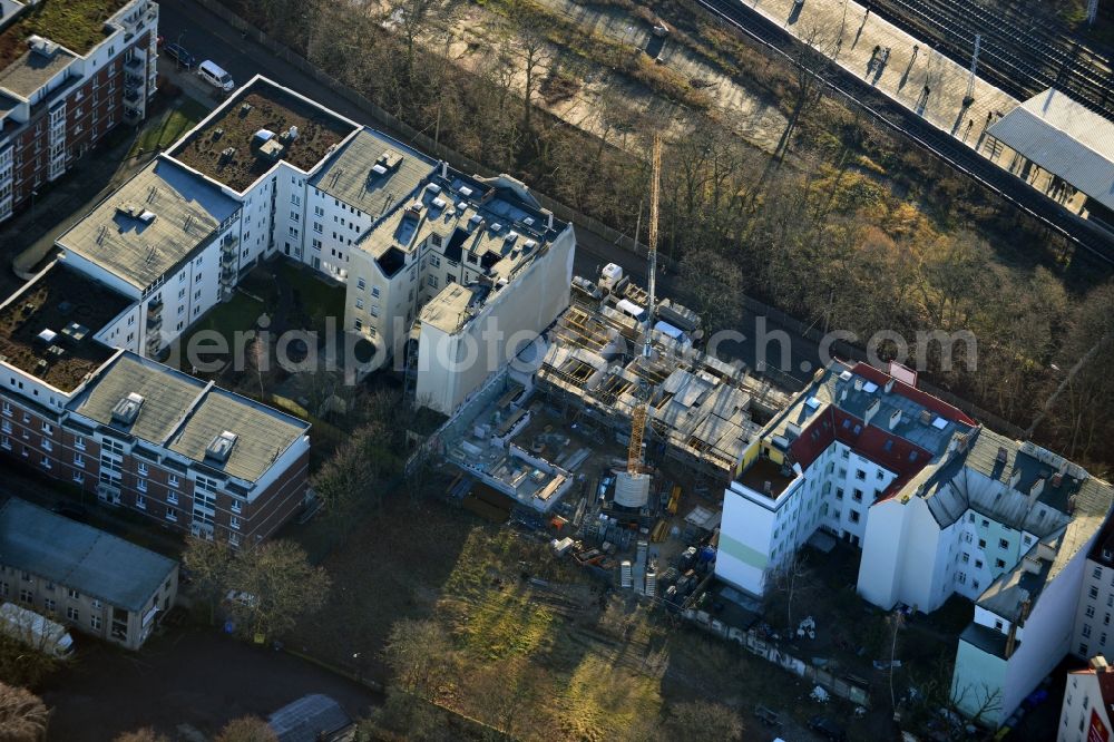 Aerial photograph Berlin OT Köpenick - Construction site in the residential area on Stellingdamm right next to the S-Bahn station Berlin - Köpenick