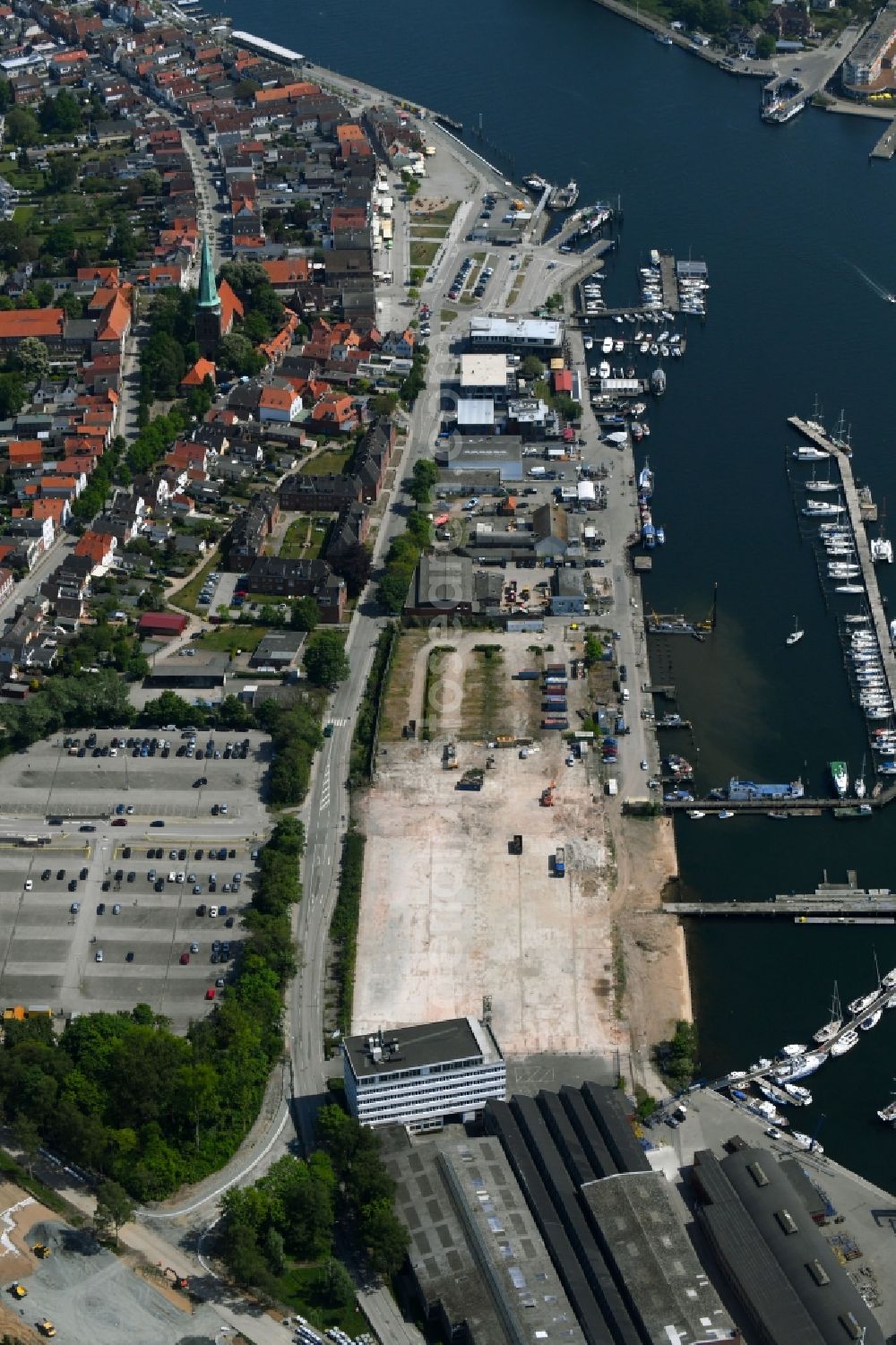 Aerial photograph Travemünde - Residential construction site with multi-family housing development- on the Auf dem Baggersand in Travemuende in the state Schleswig-Holstein, Germany