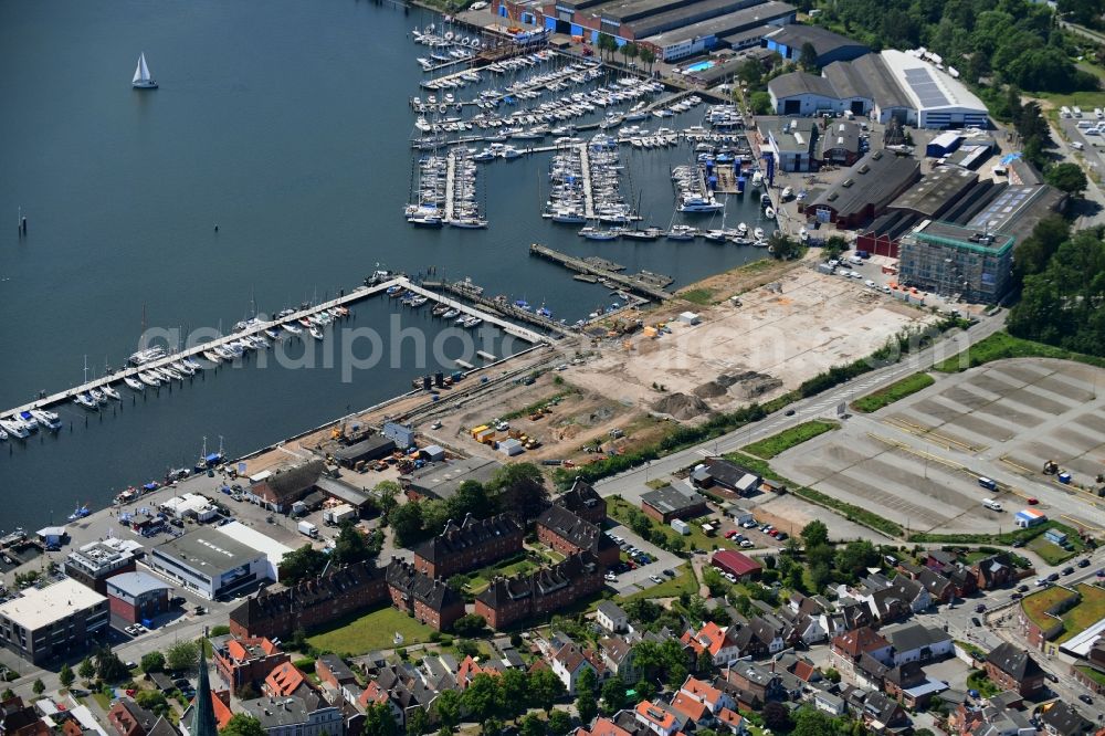 Lübeck from the bird's eye view: Residential construction site with multi-family housing development- on the Auf dem Baggersand in Travemuende in the state Schleswig-Holstein, Germany