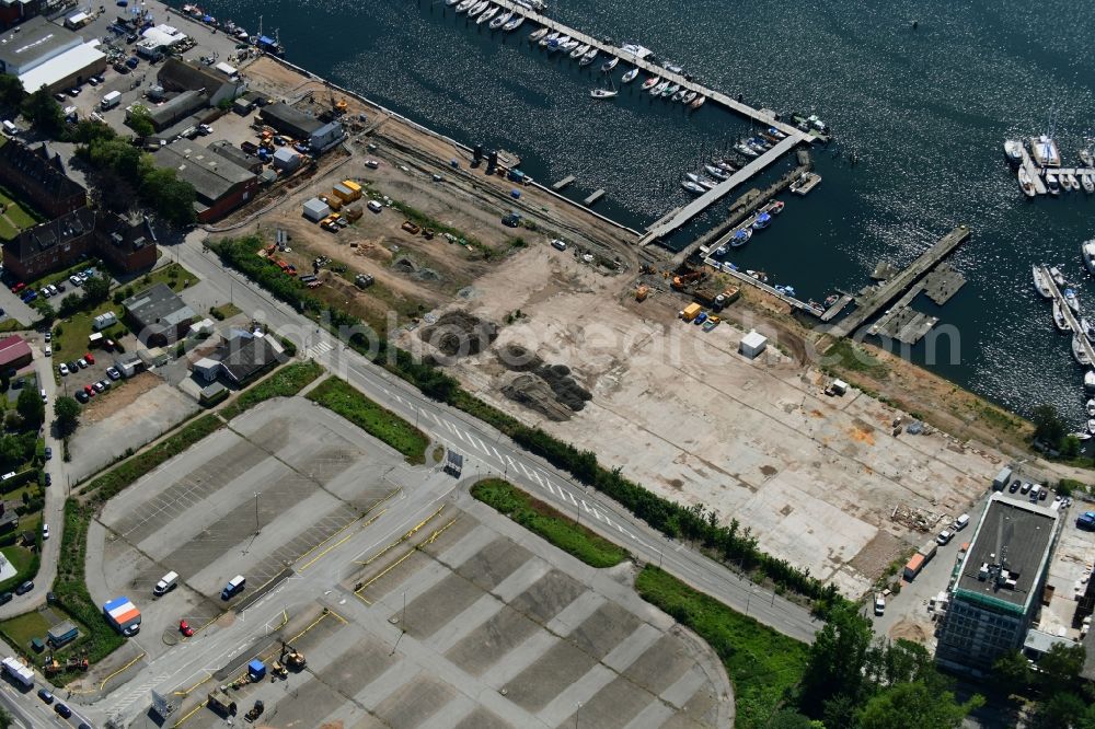 Lübeck from the bird's eye view: Residential construction site with multi-family housing development- on the Auf dem Baggersand in Travemuende in the state Schleswig-Holstein, Germany