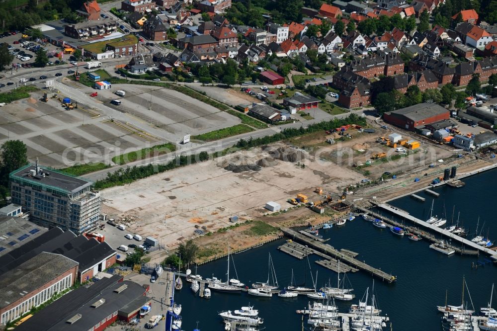 Lübeck from the bird's eye view: Residential construction site with multi-family housing development- on the Auf dem Baggersand in Travemuende in the state Schleswig-Holstein, Germany